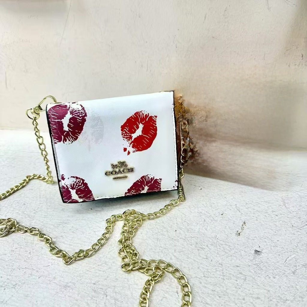 Billetera Cruzada Coach (copia)