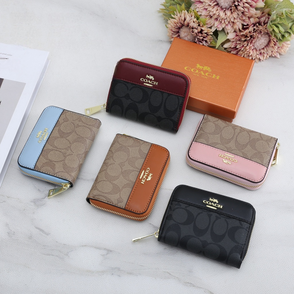 Monedero Coach